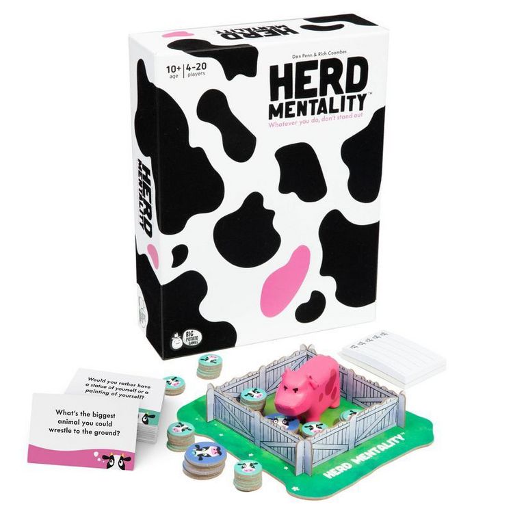 Box of "Herd Mentality" game with cow pattern design, pink cow figurine in a pen, and question cards.
