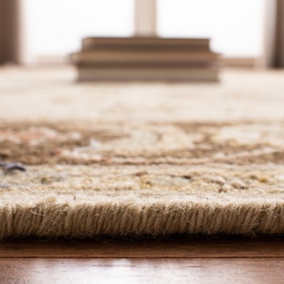 Ivory and Brown 6' x 9' Handwoven Wool Area Rug