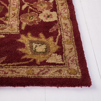 Handmade Wine and Gold Tufted Wool Area Rug