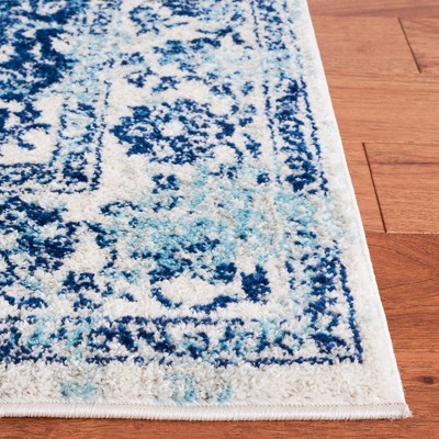 Ivory and Blue 8' x 10' Synthetic Square Area Rug