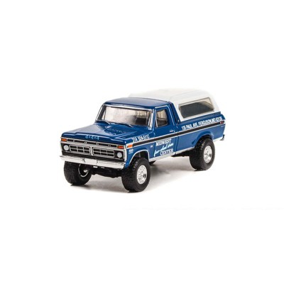 Greenlight Collectibles 1/64 1974 Ford F-250 with Camper Shell, Midwest 4WD Center 30345