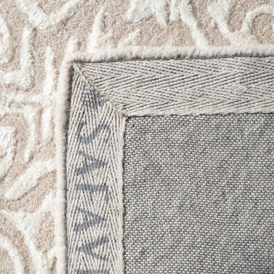 Beige and Ivory Rectangular Hand-Tufted Wool Area Rug