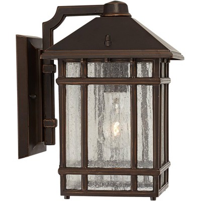 Kathy Ireland Bronze 11" Outdoor Wall Light with Frosted Seeded Glass