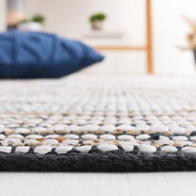 Handmade Black and Ivory Cowhide Leather 8' x 10' Area Rug