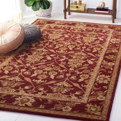 Handmade Wine and Gold Tufted Wool Area Rug