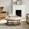 Chloe Vegan Leather Round Cocktail Ottoman with Storage and Nailhead | ARTFUL LIVING DESIGN - 3 of 4