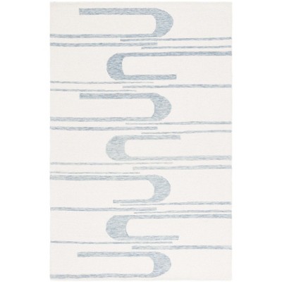 Ebony EBN951 Handmade Tufted Rug - Safavieh