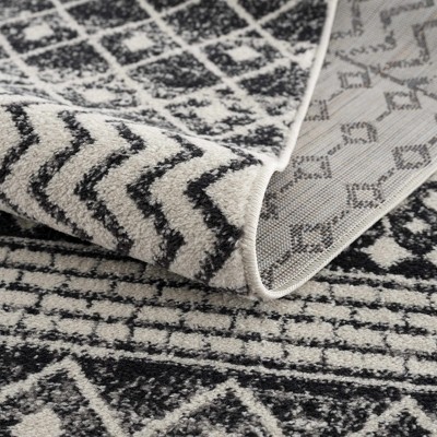 Constantin Black and Gray Bohemian Polypropylene Area Rug 6'7" x 9'