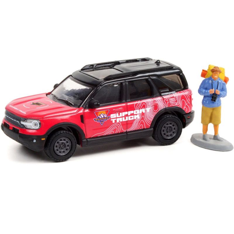 2021 Ford Bronco Sport Pink & Black "Off-Roadeo Adventure Support Truck" w/ Backpacker Figurine 1/64 Diecast Car by Greenlight, 2 of 4