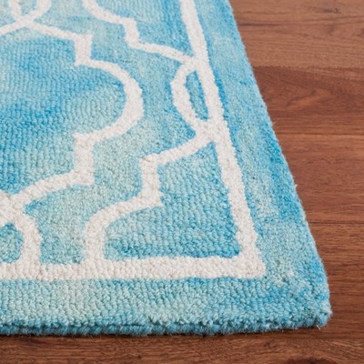 Turquoise and Ivory Hand-Tufted Wool Area Rug 4' x 6'