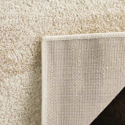 Cream and Champagne Abstract Rectangular 9' x 12' Area Rug