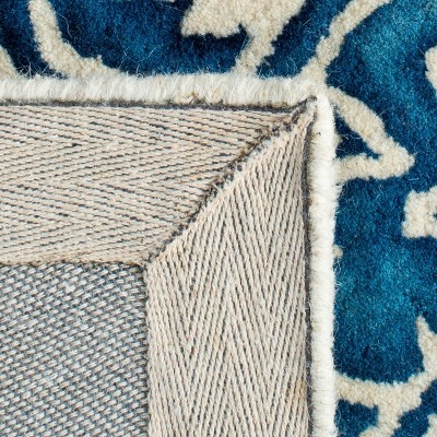 Ivory and Blue Hand-Tufted Wool Area Rug 5' x 8'