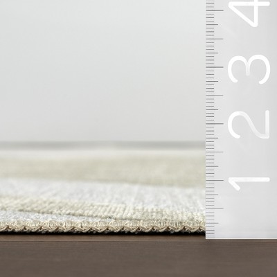 Sevyn Green and White Abstract Reversible 4' x 6' Area Rug