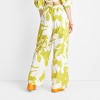 Women's Wide Leg Relaxed Floral Pants - Future Collective™ with Alani Noelle White/Olive - image 2 of 3