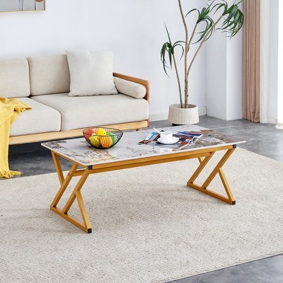 A coffee table is made of rock slab material, with a natural and smooth marble pattern on the surface, 47*23.6
