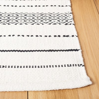 Ivory and Black Handwoven Wool Rectangular Area Rug, 6' x 9'