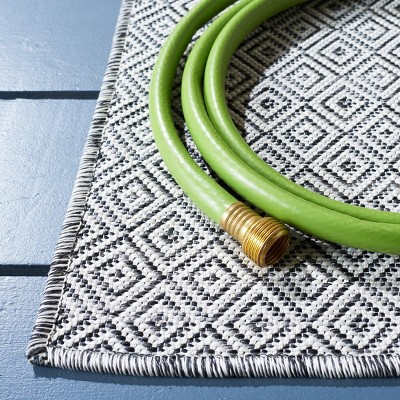 Ivory and Black Rectangular Geometric Indoor/Outdoor Rug