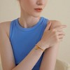 Free bird Cross Birthstone Bracelet | Dainty 14K Gold Plated Cross Charm Bracelet | Stretchable Elastic Gold Beaded Bracelet - 2 of 4