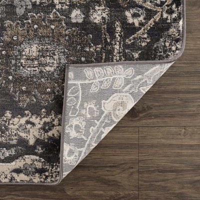 Georgiana Black and Beige Polypropylene Traditional Area Rug 6'4" x 9'