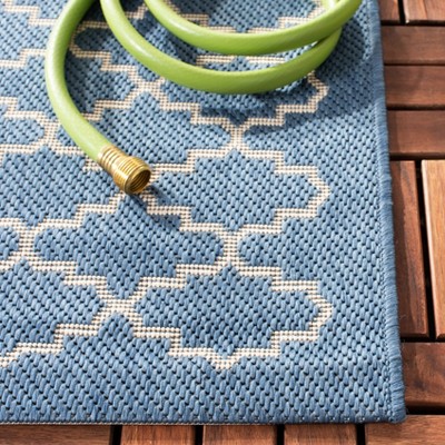 Blue and Beige 9' x 12' Synthetic Outdoor Area Rug