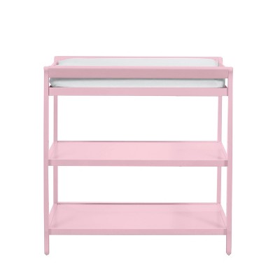 Pink crib with store changing table