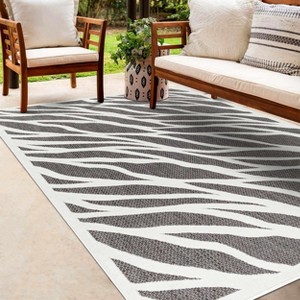 Hauteloom Astra Zebra Print Black Outdoor Rug - 1 of 4