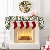 6-foot pre-lit Christmas wreath with 20 warm white lights and a decorative bow, suitable for indoor/outdoor decoration. - 2 of 4
