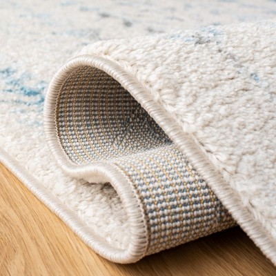 Ivory and Turquoise Hand-Knotted Synthetic 4' x 6' Area Rug