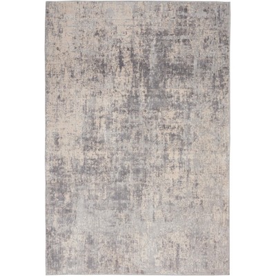 Ivory Abstract Power-Loomed Synthetic 5'3" x 7'3" Area Rug