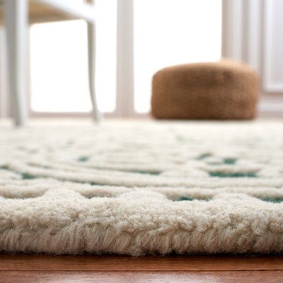 Ivory Elegance 5' x 8' Hand-Tufted Wool Area Rug