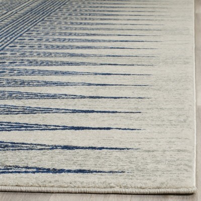 Ivory and Blue High Pile Synthetic Area Rug