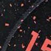 black + orange dots