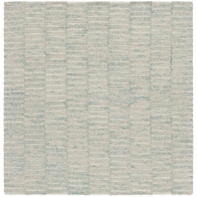 Ebony EBN751 Handmade Tufted Rug - Safavieh