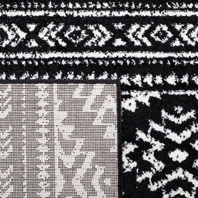 Bohemian Bliss Geometric Black & Ivory Synthetic Area Rug - 8' x 10'