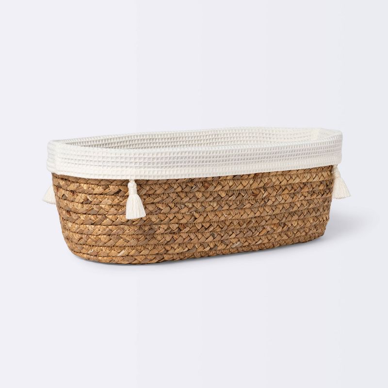 Natural Weave Oval Storage Bin with Waffle Weave Liner - Cloud Island™, 1 of 6