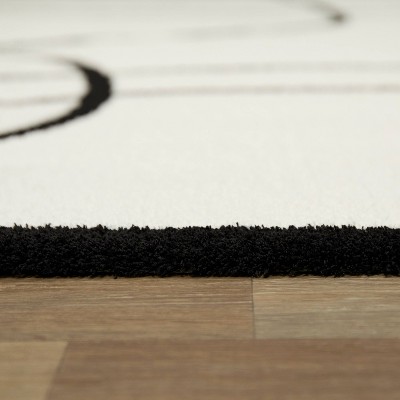 Cajal White and Black Abstract Kids' Rectangular Area Rug 5' x 7'