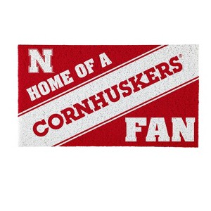 Evergreen Home of a Fan University of Nebraska 28" x 16" Woven PVC Indoor Outdoor Doormat - 1 of 4