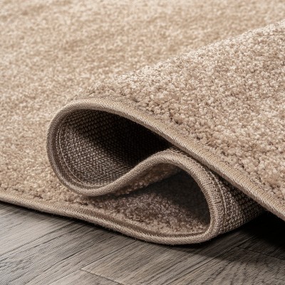 Beige Solid Low-Pile Synthetic Indoor Area Rug
