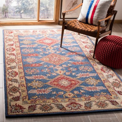 Handmade Blue and Red Wool Tufted 6' x 9' Area Rug