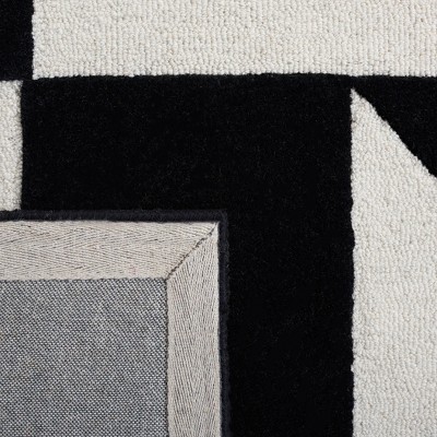 Handmade Black and Rust Geometric Wool Area Rug, 4 ft. x 6 ft.