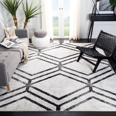 Ivory and Charcoal Geometric Synthetic Area Rug