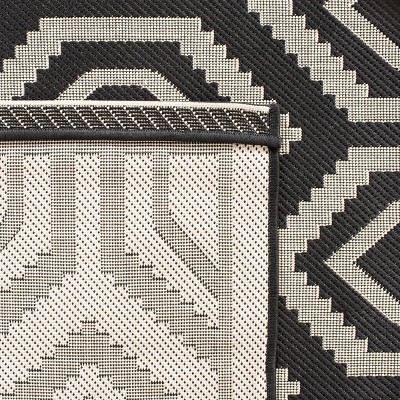 Rectangular Black and Beige 5' x 7' Wool Blend Area Rug