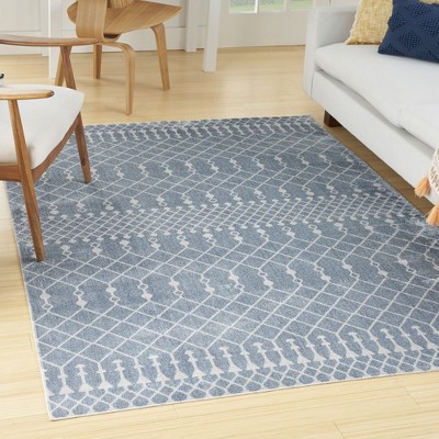 Astra Blue and Ivory Synthetic 4' x 6' Trellis Area Rug