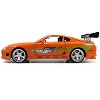 Dom's 1970 Dodge Charger R/T Black and Brian's Toyota Supra Orange with ...