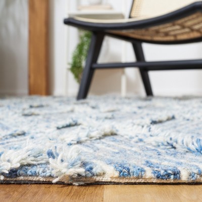 Ivory and Blue Hand-Knotted Wool 6' x 9' Area Rug