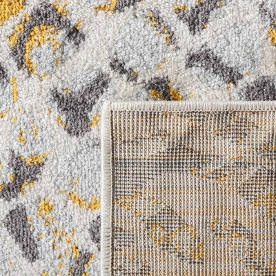Ivory and Gold Synthetic Round Hand-knotted Rug
