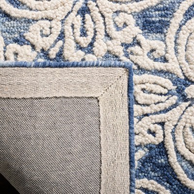Handmade Tufted Blue and Ivory Floral Wool 8' x 10' Area Rug