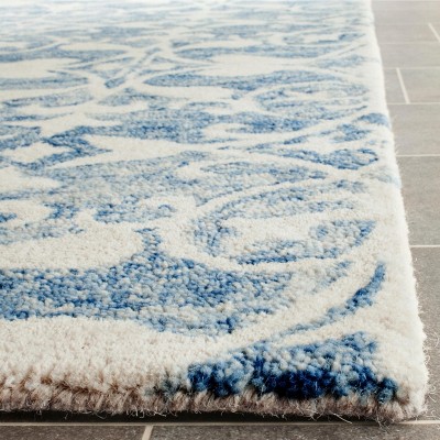 Hand-Tufted Dark Blue and Ivory Wool Area Rug