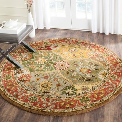 Ivory Elegance 6' Round Tufted Wool Area Rug