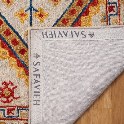 Handmade Ivory Wool Square Tufted Area Rug - 5' x 8'